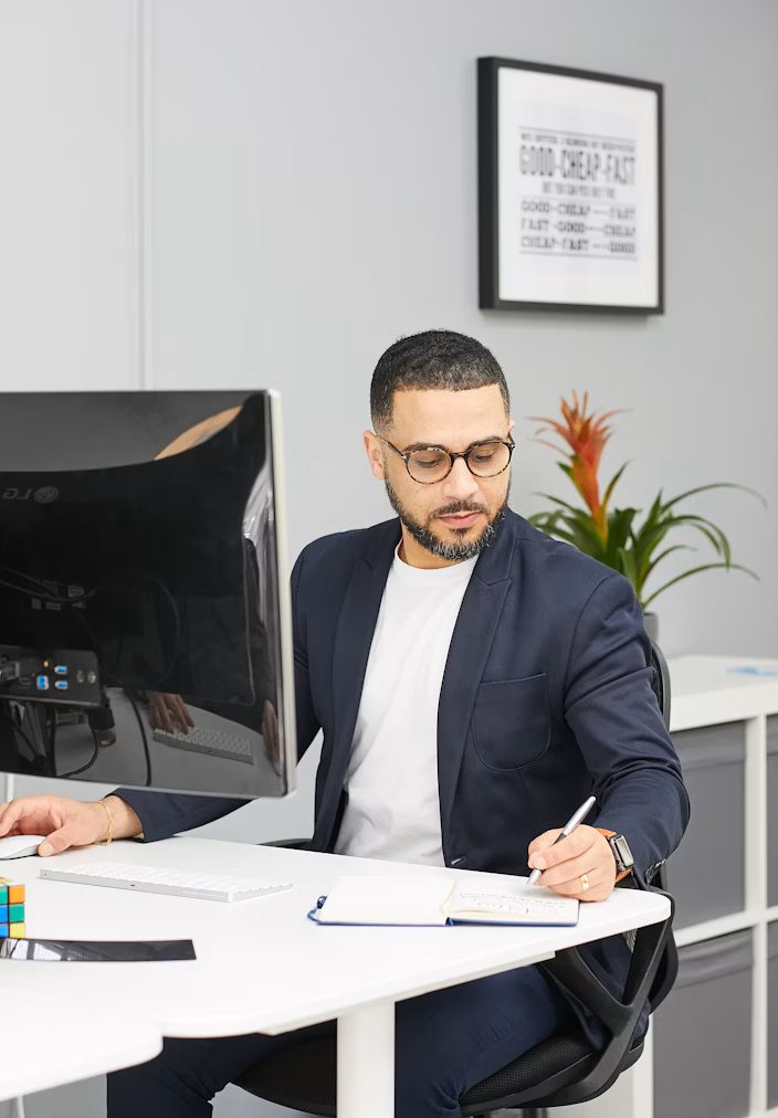 A man sitting at a desk